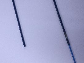 Catella's catheter "Rikishi" (right). Drilled hole in guiding catheter.